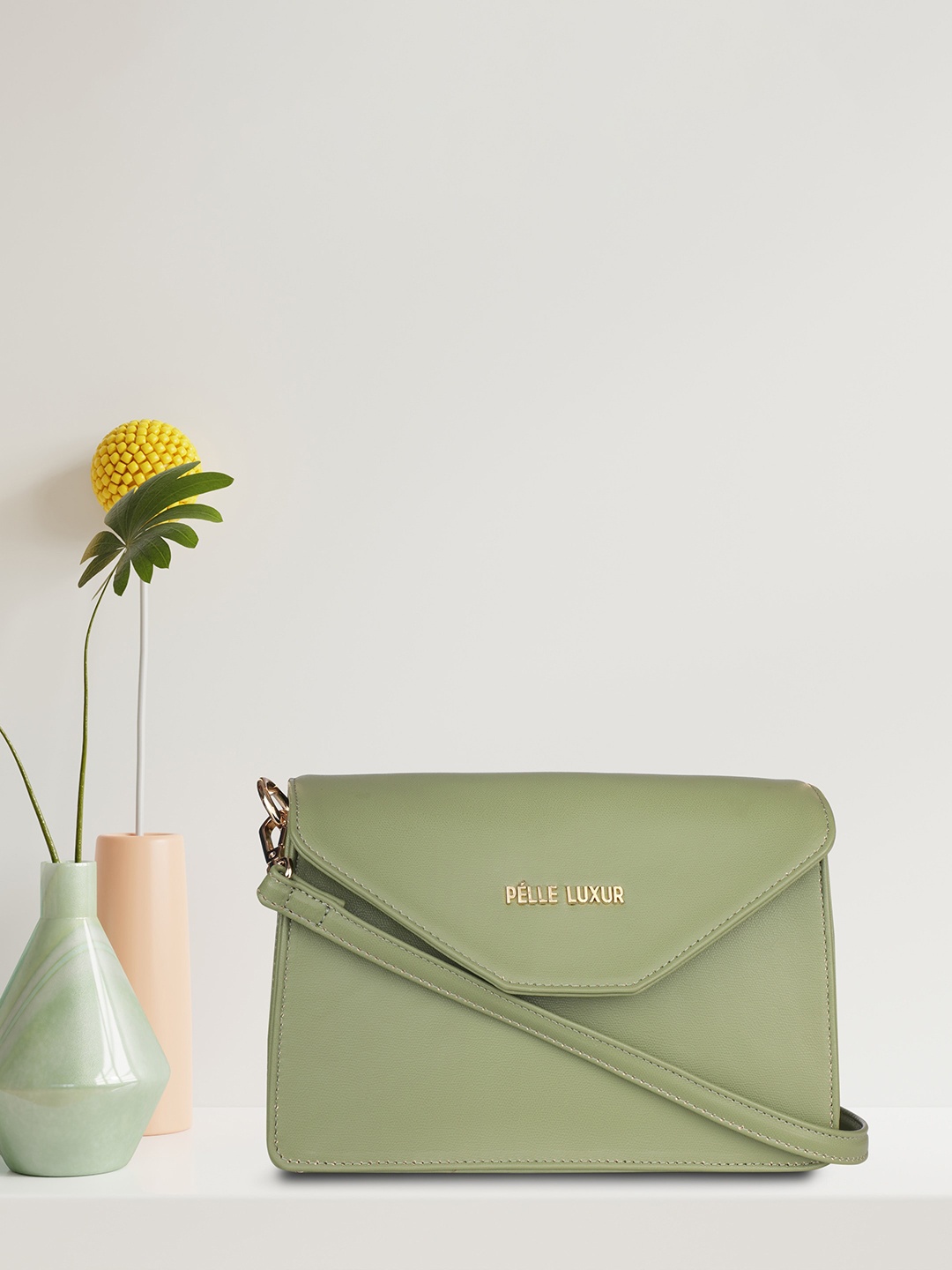 

PELLE LUXUR Green Leather Structured Sling Bag with Tasselled