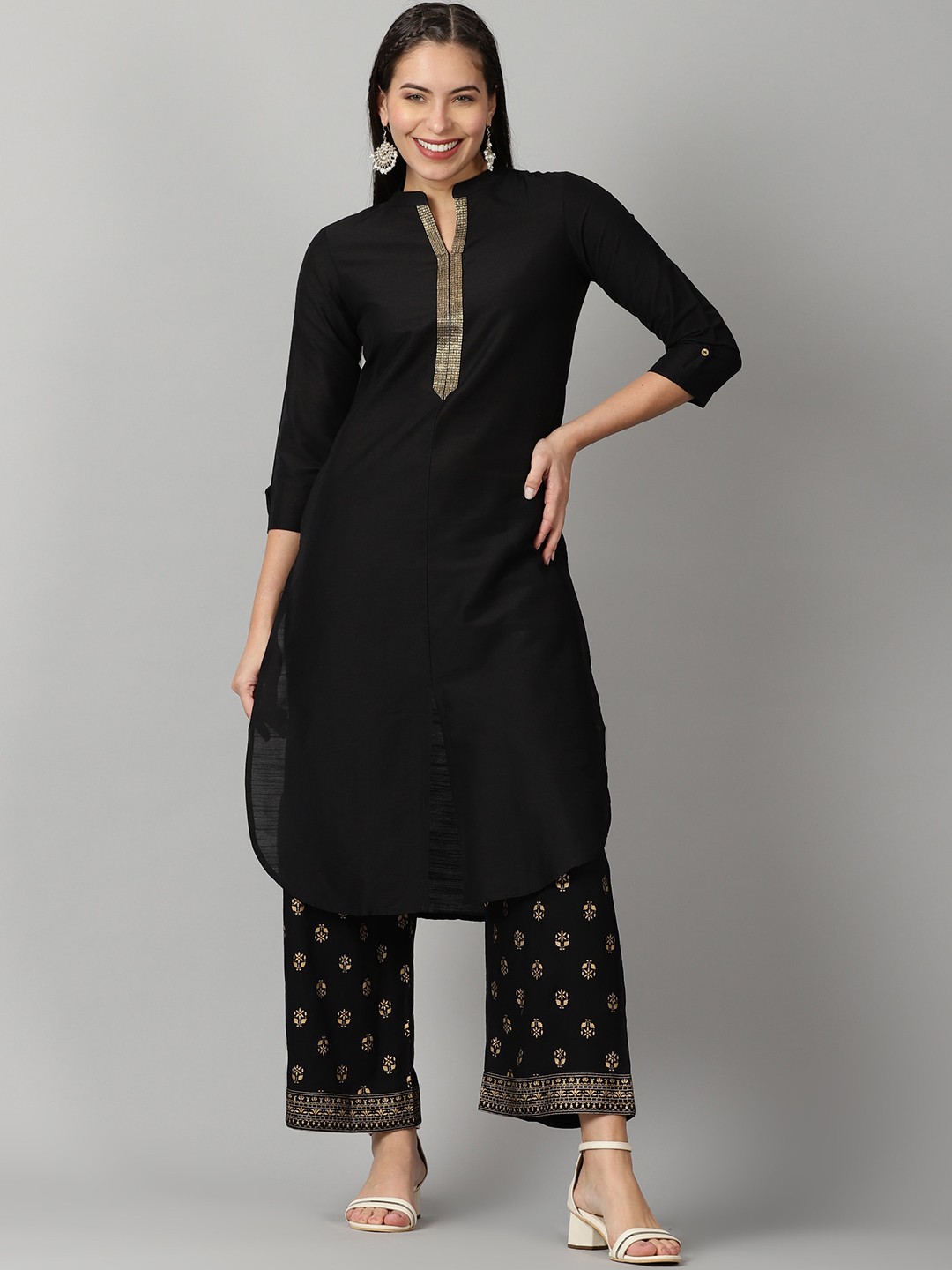 

Saffron Threads Women Black Ethnic Motifs Pleated Thread Work Kurta with Palazzos
