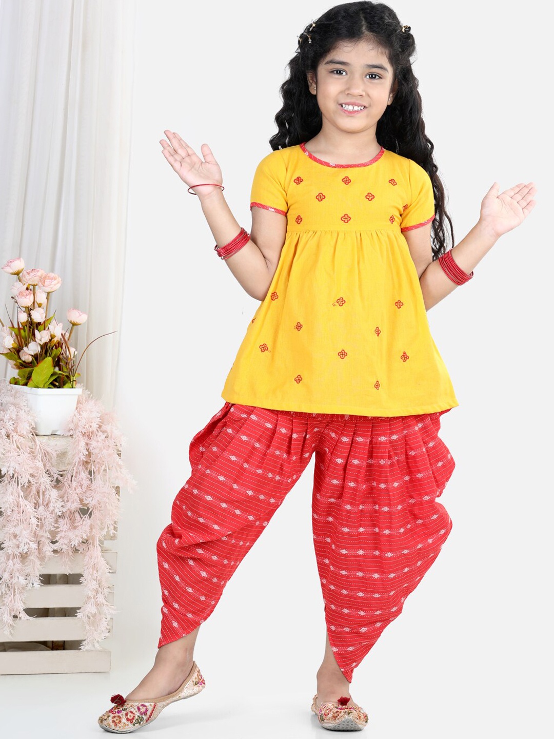 

Kinder Kids Girls Yellow Floral Embroidered Empire Pure Cotton Kurti with Dhoti Pants & With Dupatta