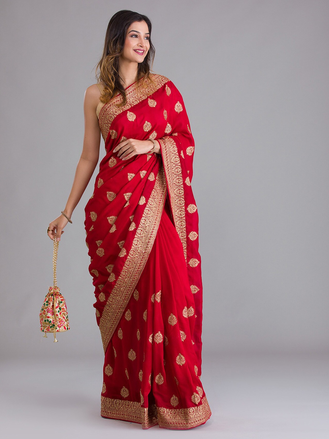 

Koskii Red & Gold-Toned Ethnic Motifs Zari Heavy Work Saree
