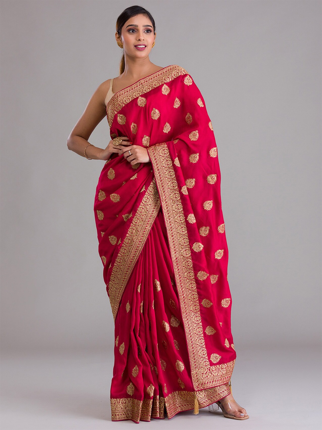 

Koskii Fuchsia & Gold-Toned Ethnic Motifs Embroidered Heavy Work Saree