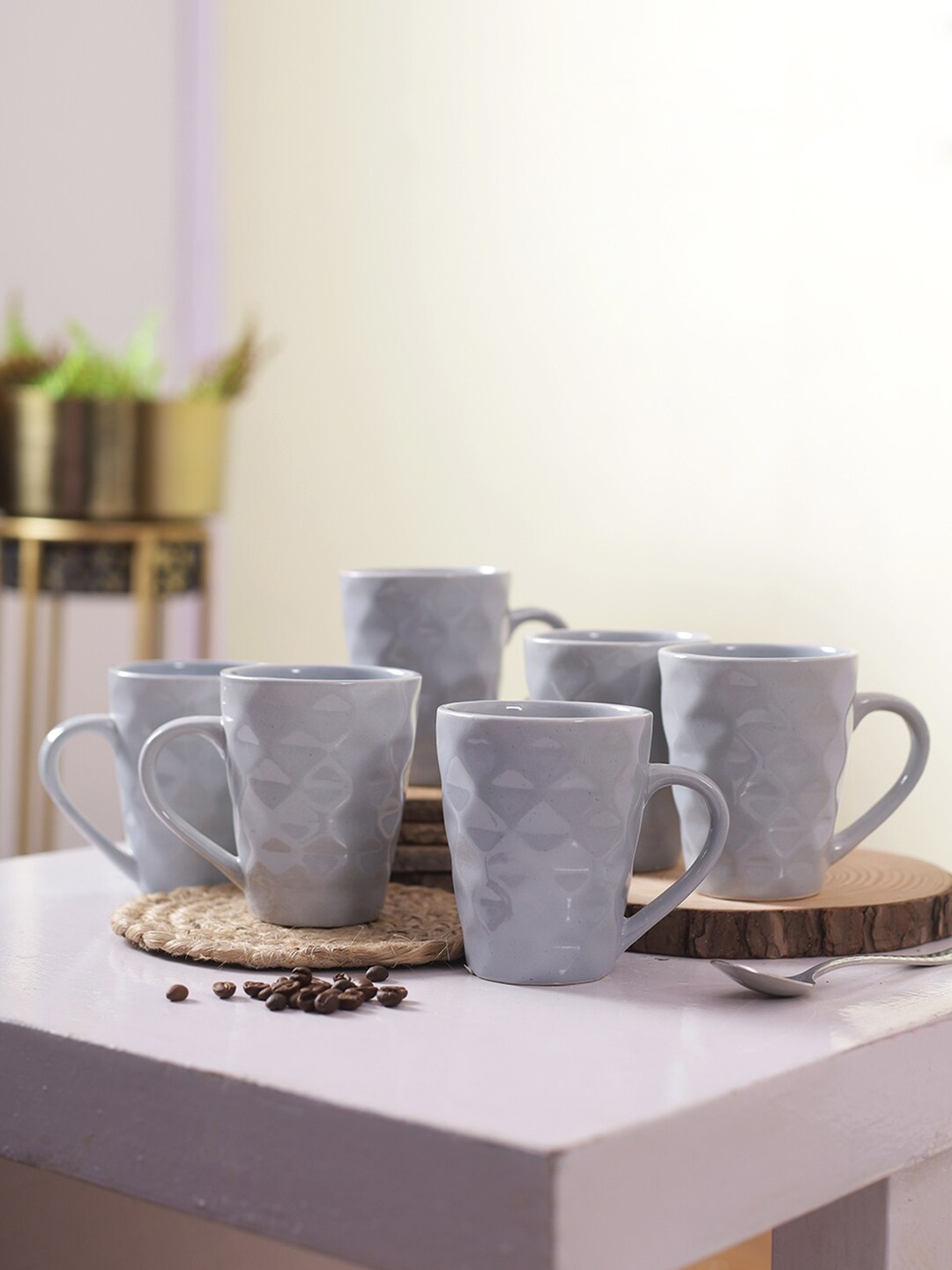 

Aapno Rajasthan Blue Set of 6 Textured Ceramic Glossy Mugs 250 ml Each