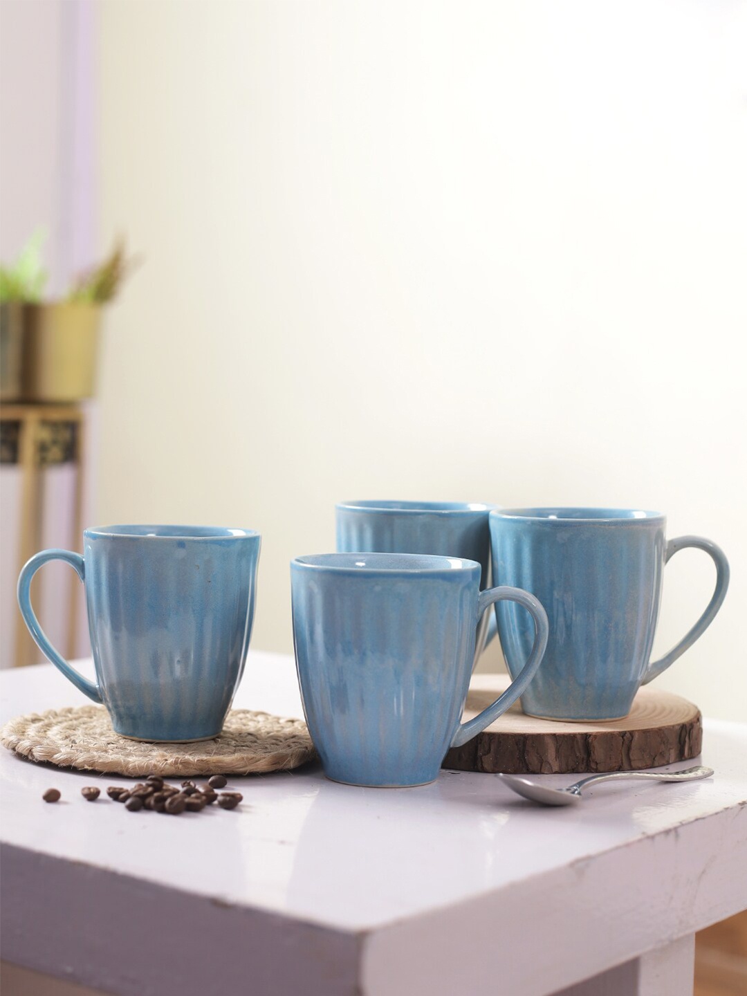 

Aapno Rajasthan Blue Solid Ceramic Glossy Mugs Set of Cups and Mugs