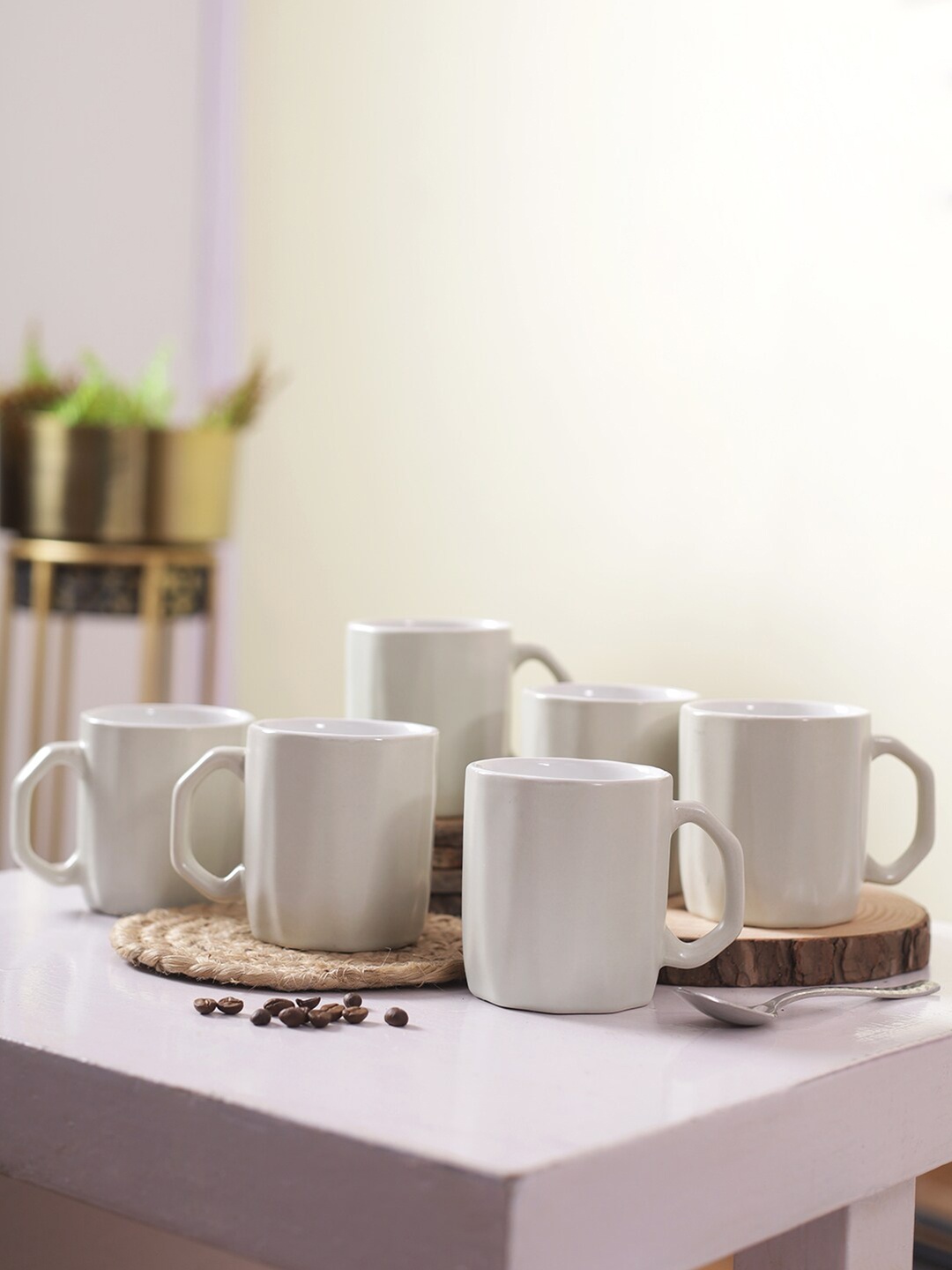 

Aapno Rajasthan White Solid Ceramic Glossy Cups Set of Cups and Mugs