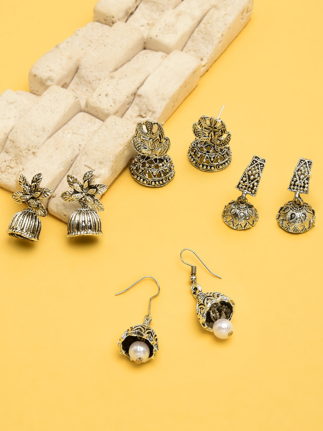 

Zaveri Pearls Set of 4 Silver-Toned Dome Shaped Jhumkas