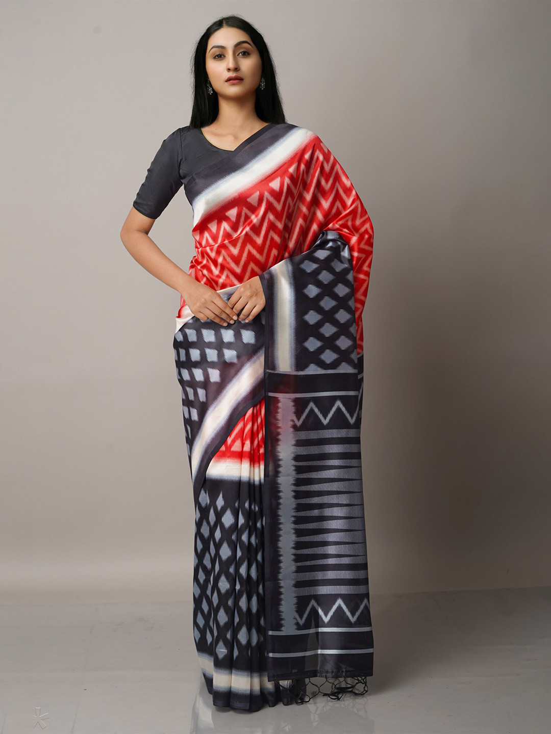 

Unnati Silks Red & Black Art Silk Block Print Saree
