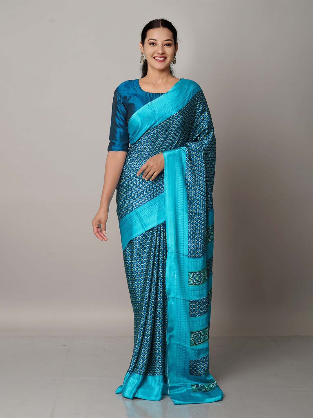 

Unnati Silks Blue & Black Floral Block Print Saree