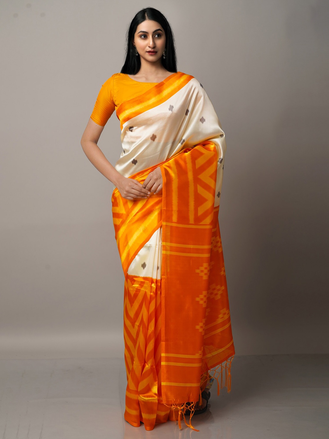 

Unnati Silks Cream-Coloured & Orange Art Silk Block Print Saree
