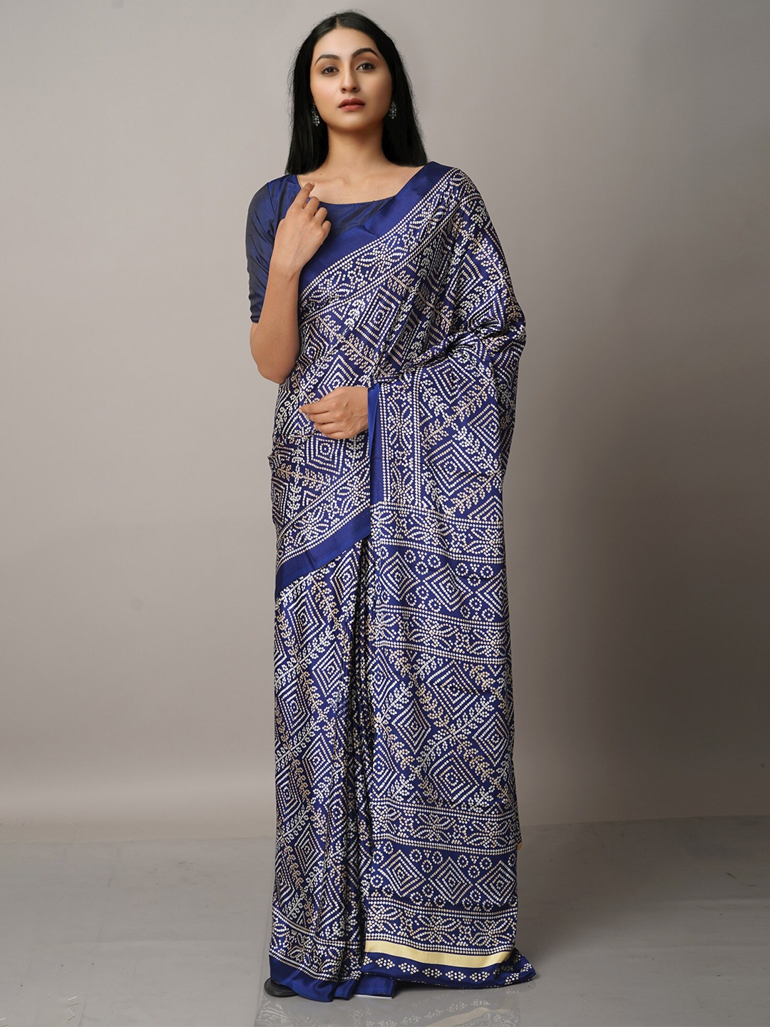

Unnati Silks Blue & White Bandhani Saree