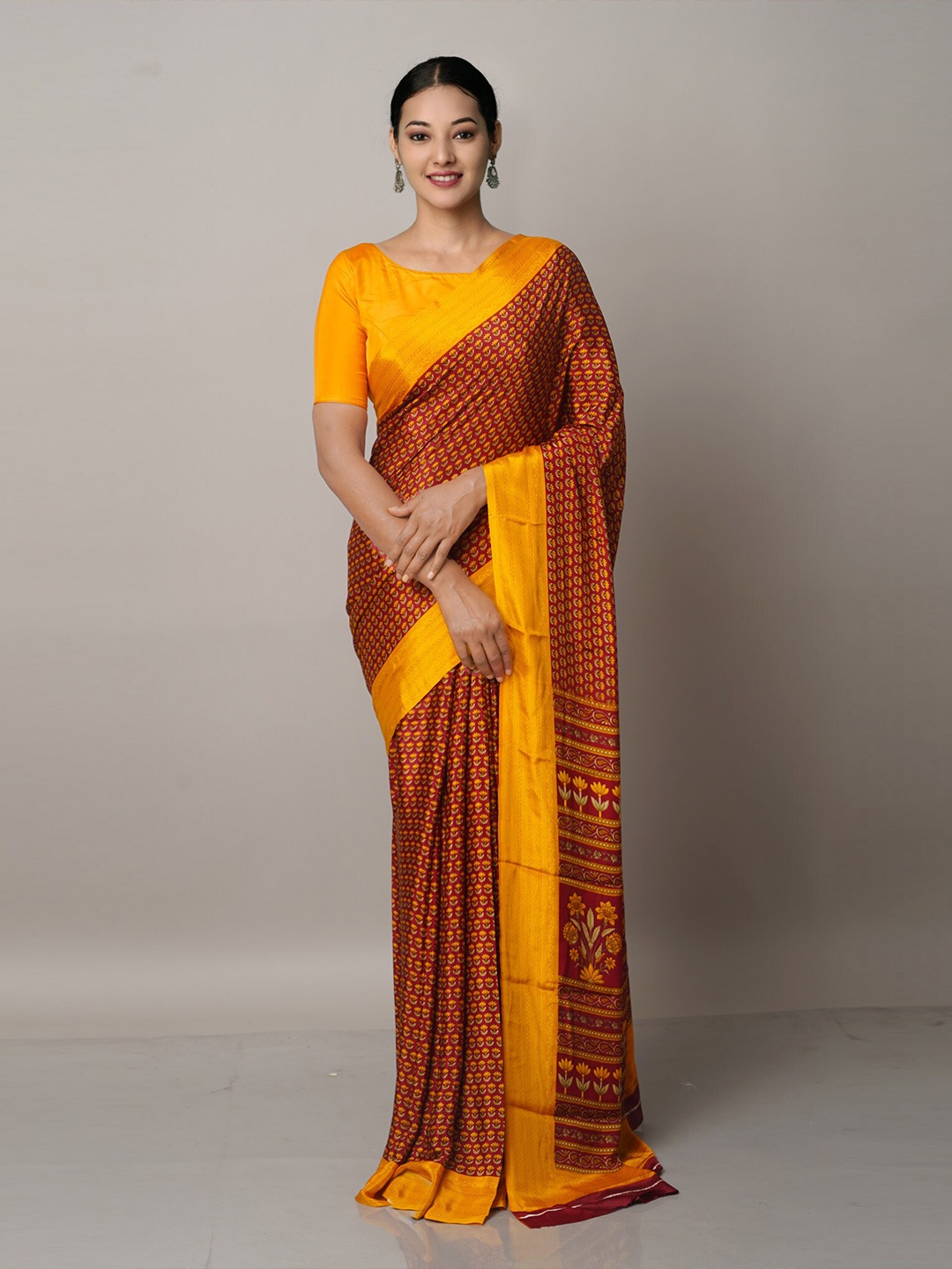 

Unnati Silks Brown & Orange Ethnic Motifs Block Print Saree