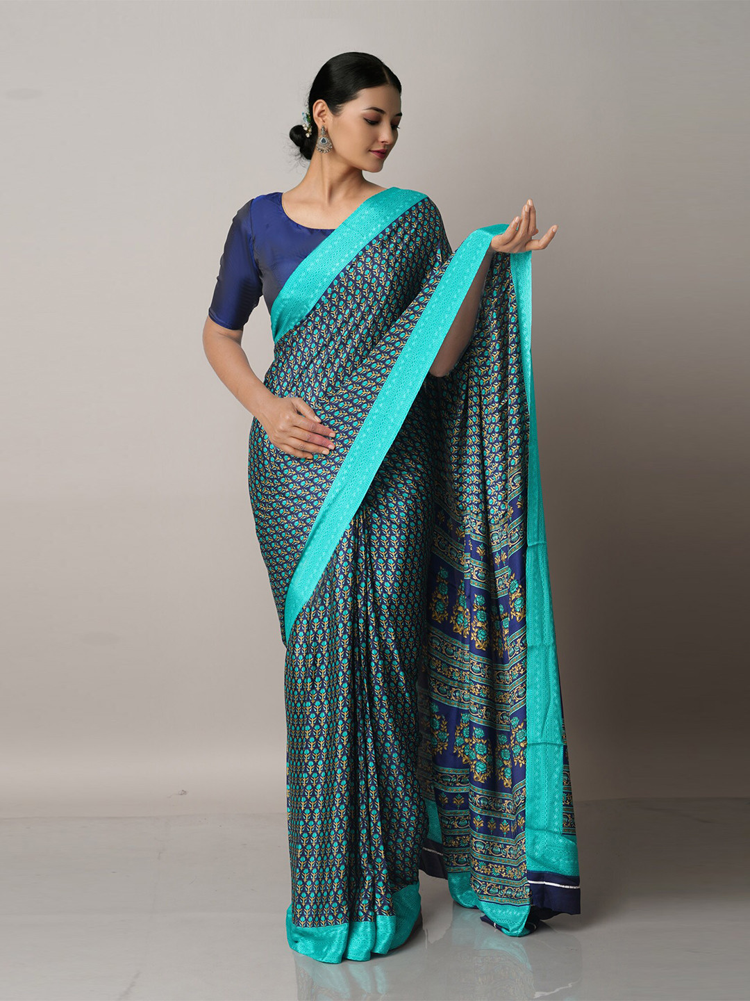 

Unnati Silks Blue Ethnic Motifs Block Print Saree