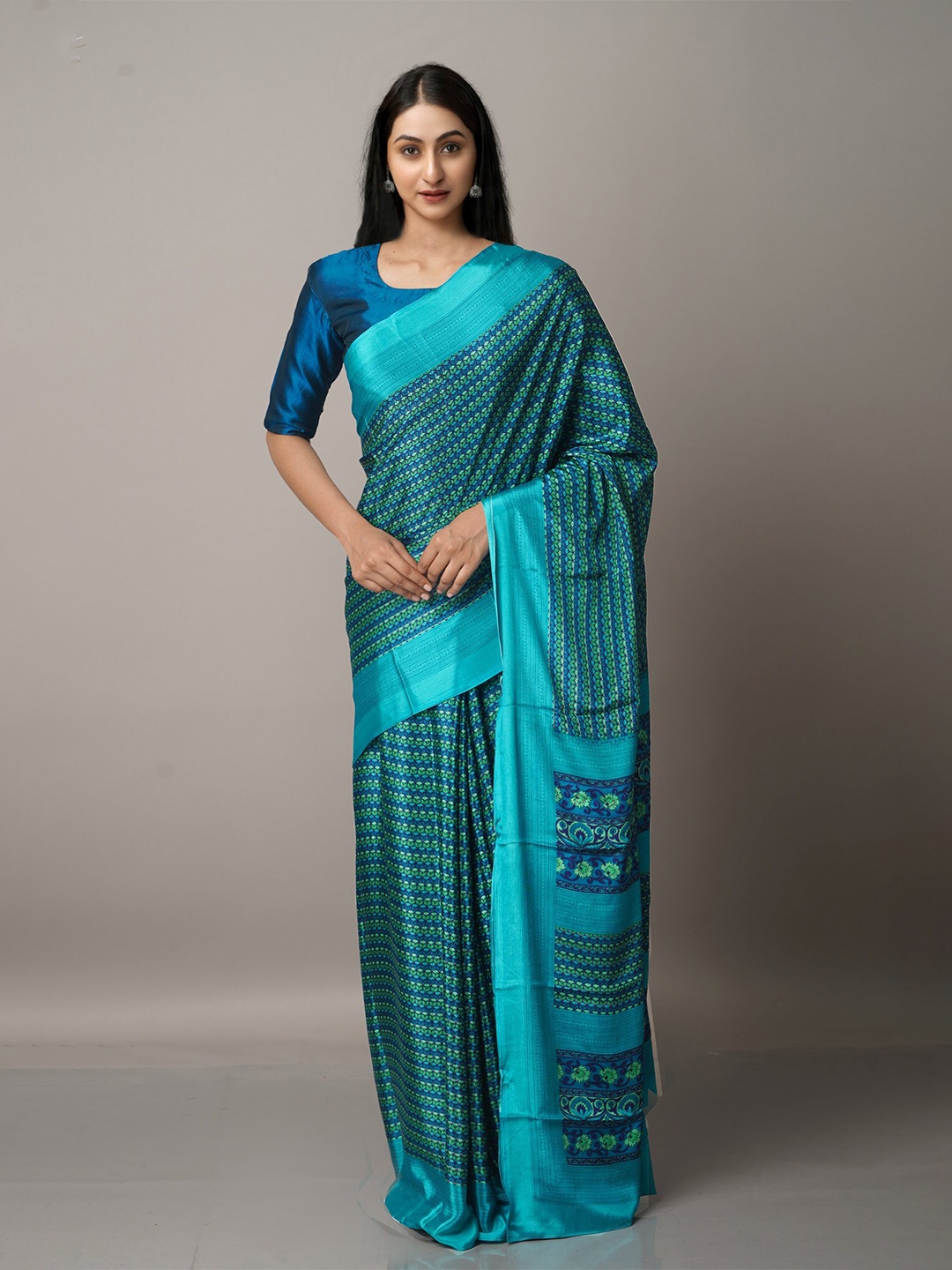 

Unnati Silks Blue & Green Ethnic Motifs Block Print Saree