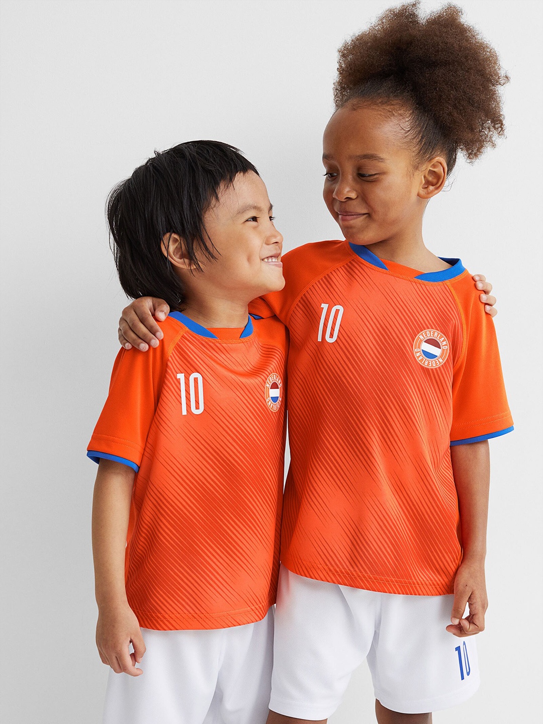 

H&M Girls Orange Football Shirt