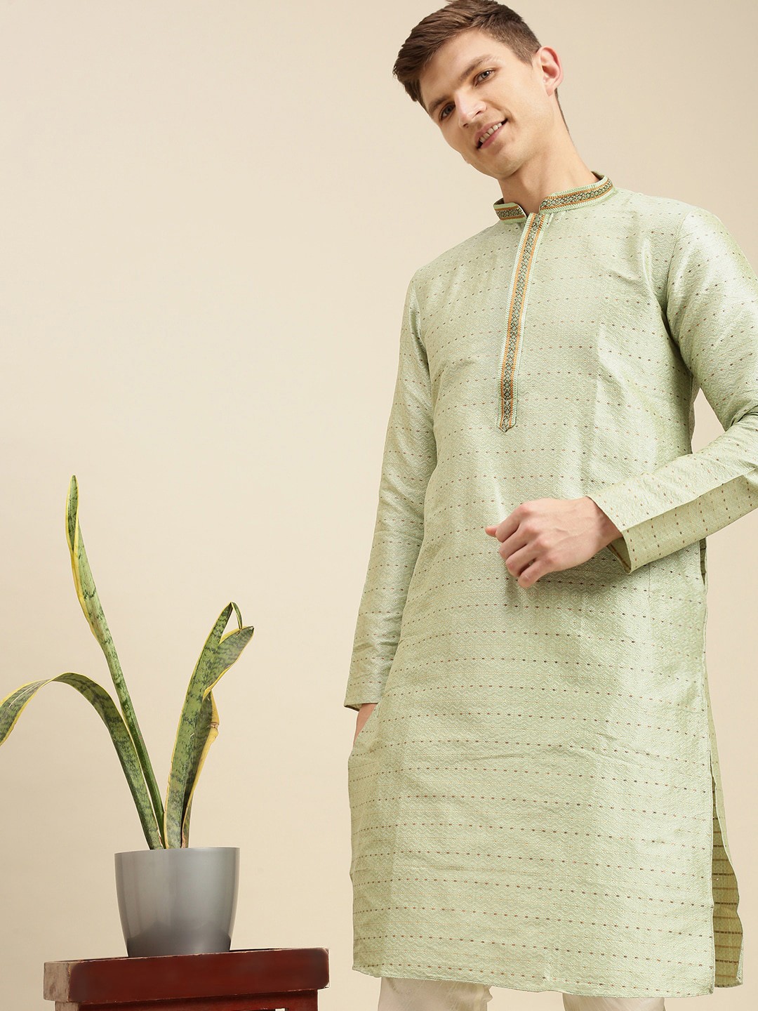 

Sanwara Men Green Embroidered Angrakha Kurta with Skirt