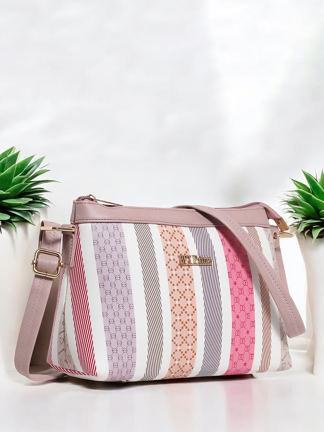 

WOMEN MARKS Peach-Coloured Printed PU Bucket Sling Bag with Tasselled