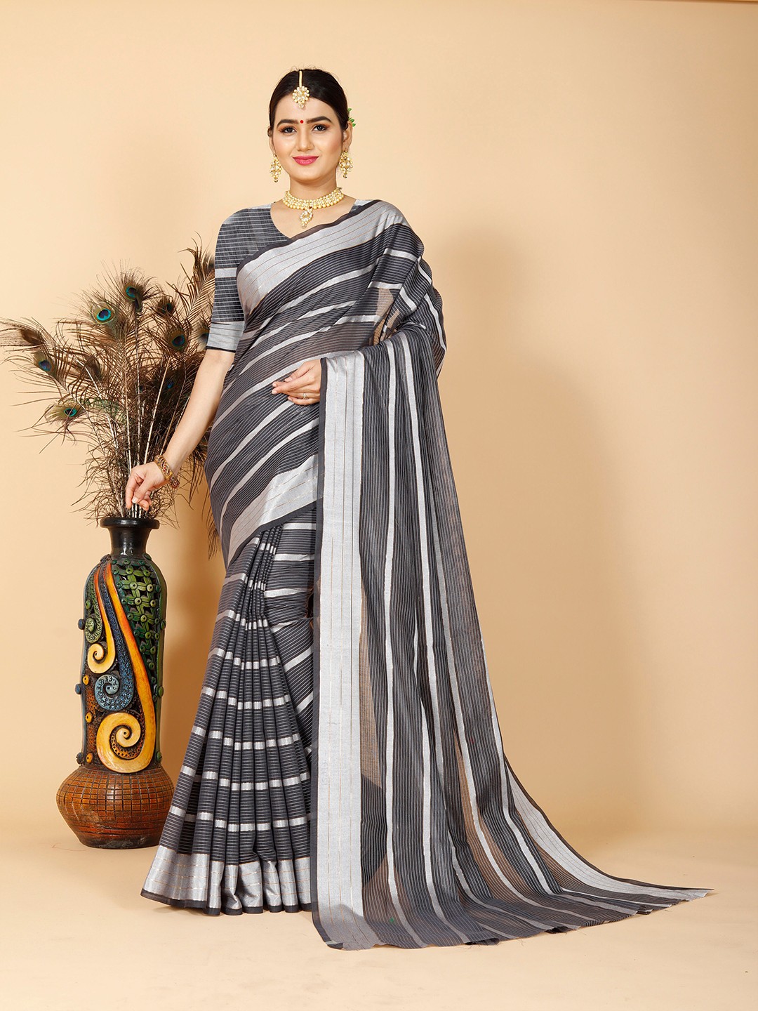 

Indian Fashionista Grey & Black Striped Zari Silk Cotton Saree