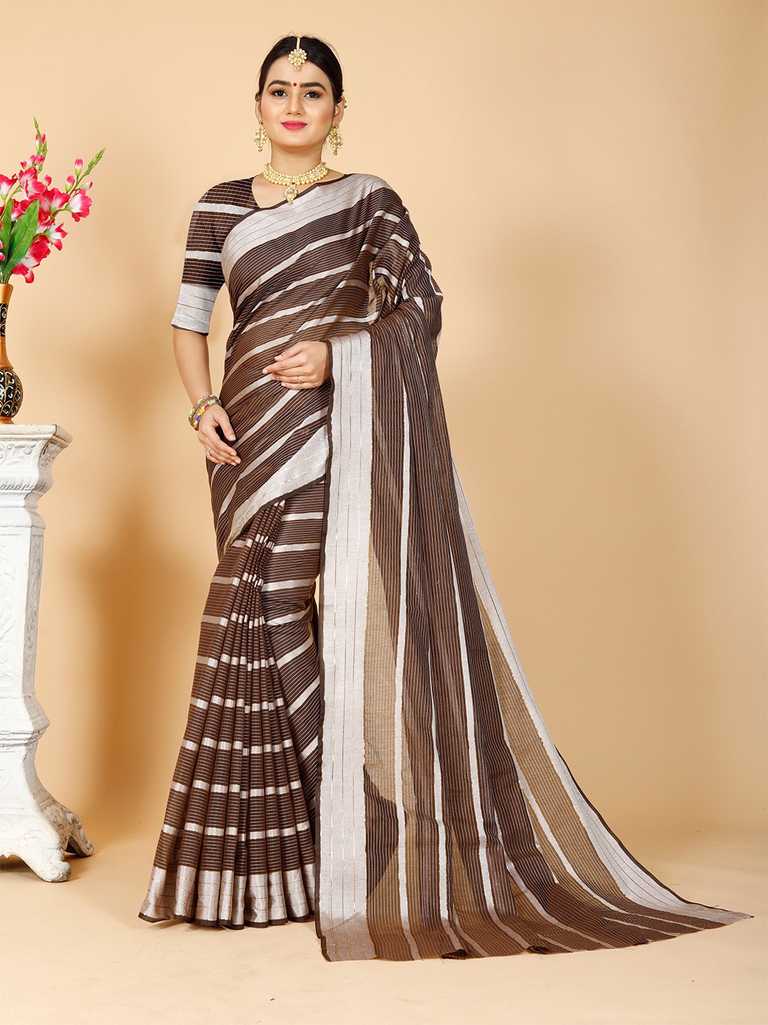 

Indian Fashionista Brown & Silver-Toned Striped Zari Khadi Saree