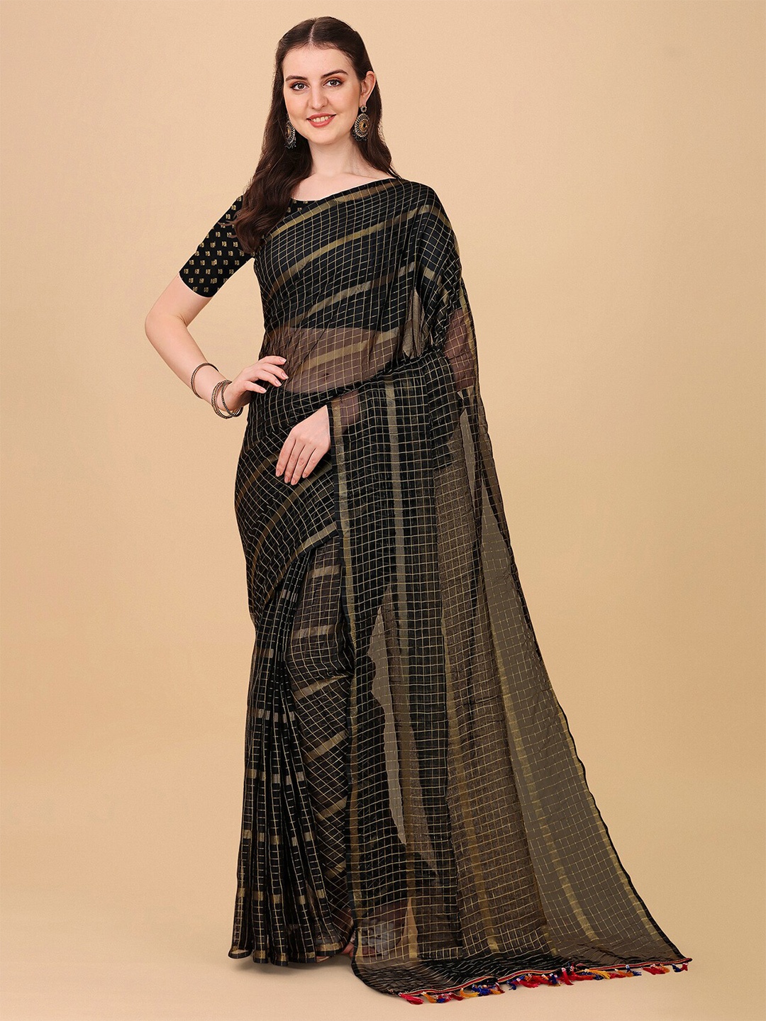 

Indian Fashionista Black And Gold Toned Checked Zari Kasavu Saree
