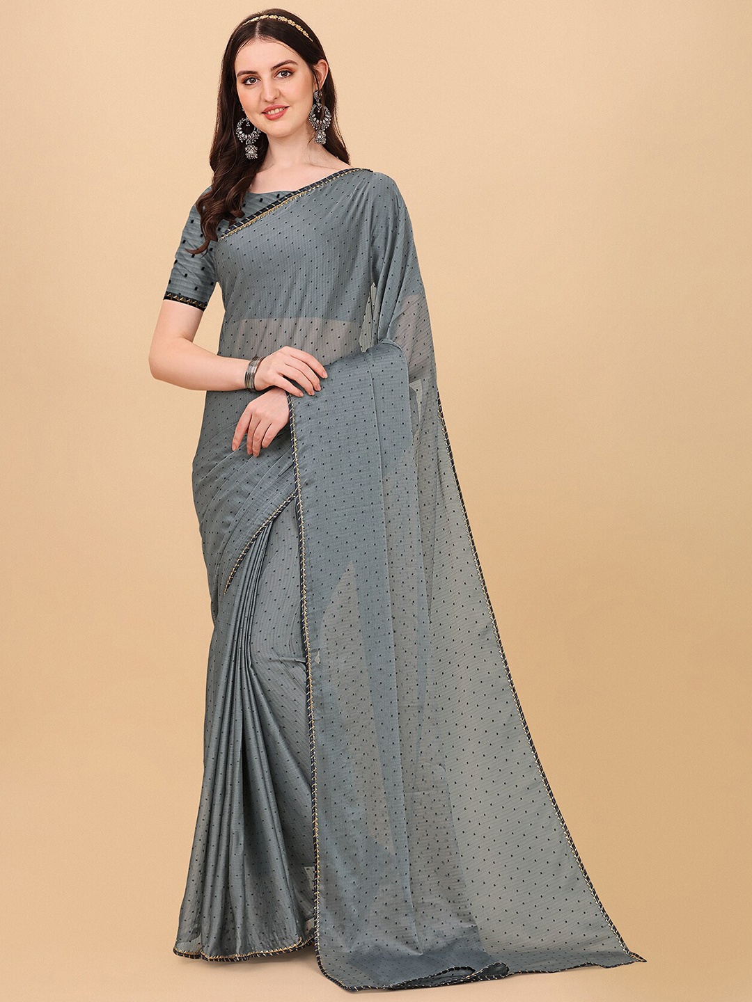 

Indian Fashionista Silver Toned Woven Design Mukaish Art Silk Tussar Saree