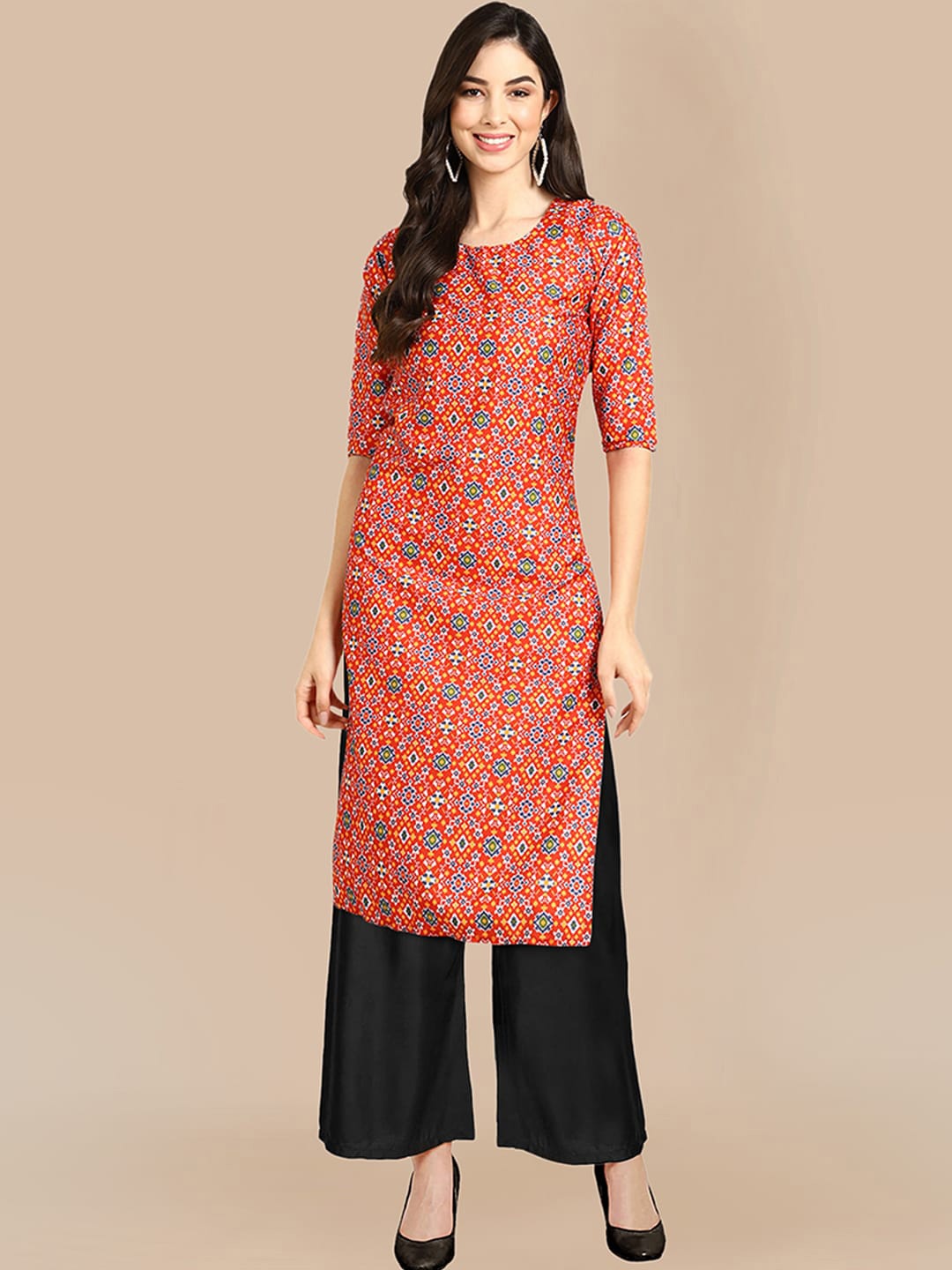 

KALINI Women Orange Printed Silk Crepe Kurta with Palazzos