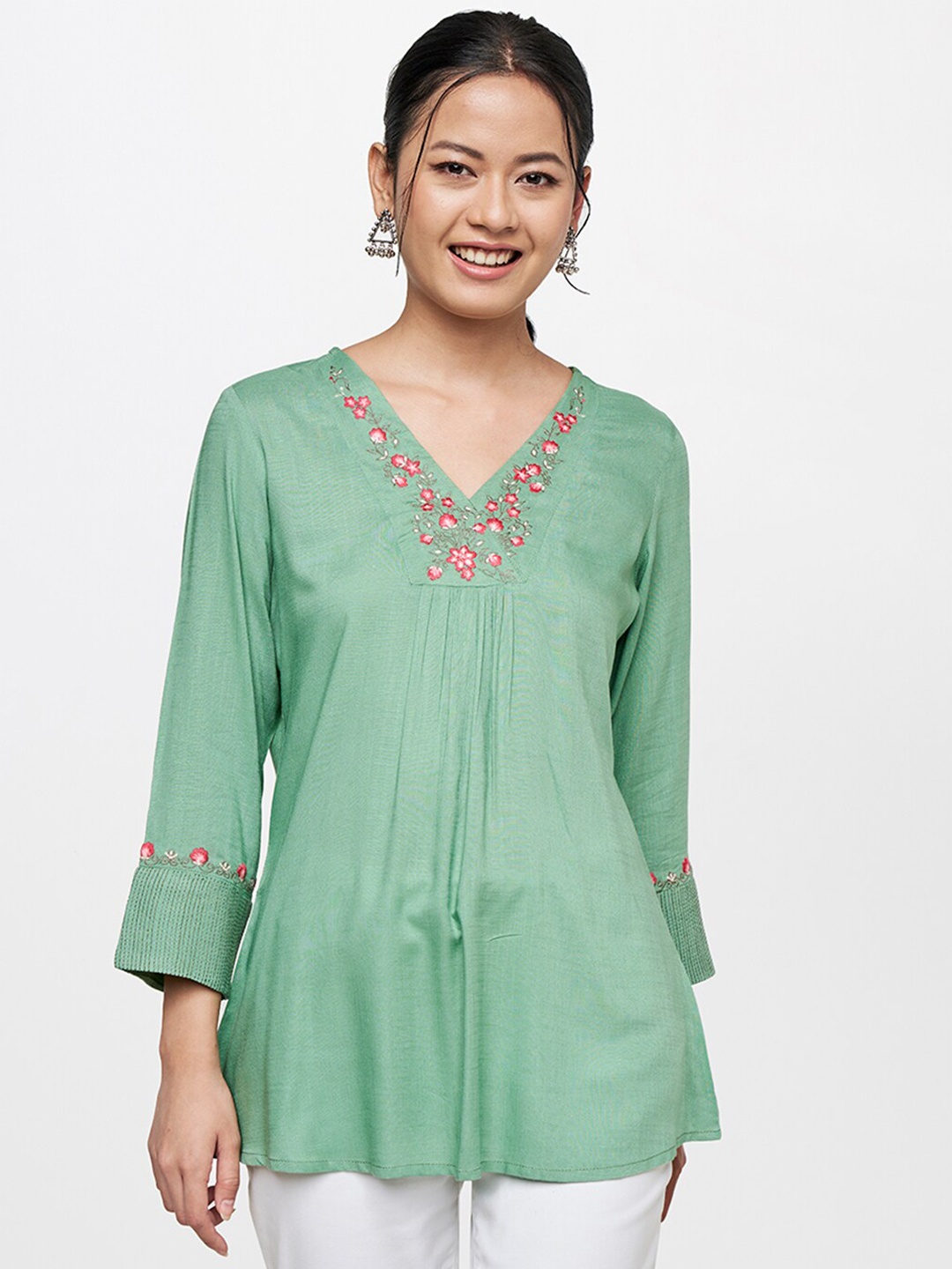 

Global Desi Women Green Embroidered Casual Top