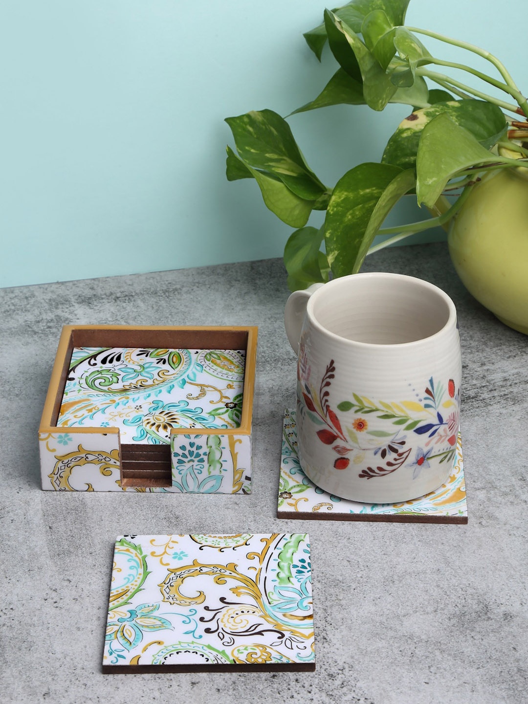 

ROMEE Set Of 6 Cream Colored & Green Printed Coasters