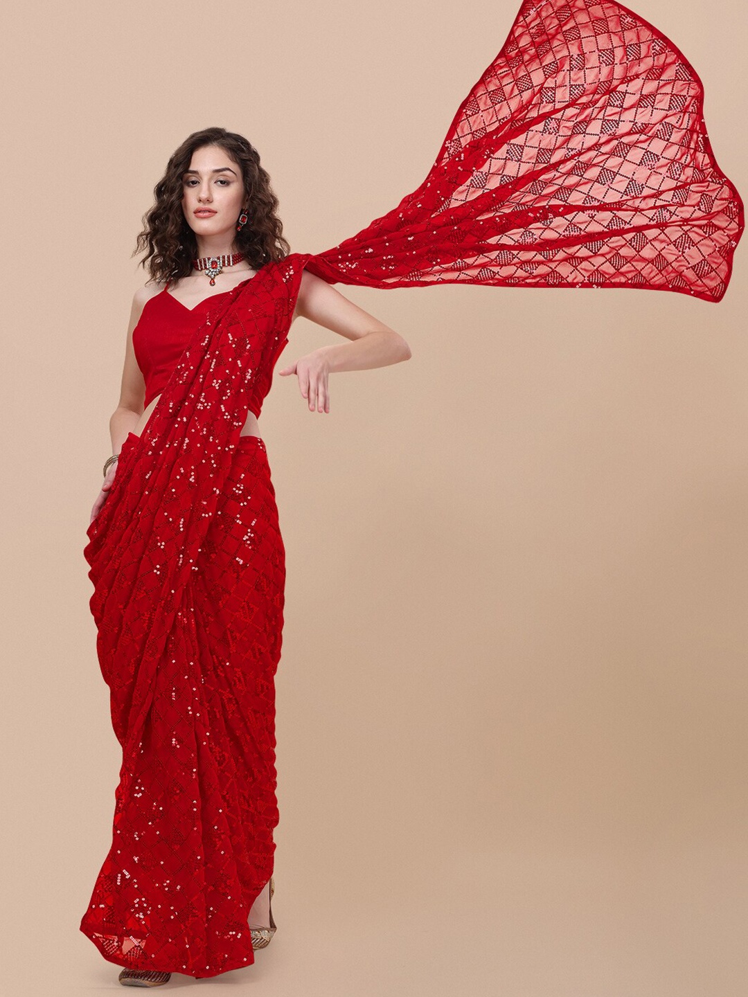 

Vaidehi Fashion Red Embellished Sequinned Pure Georgette Saree