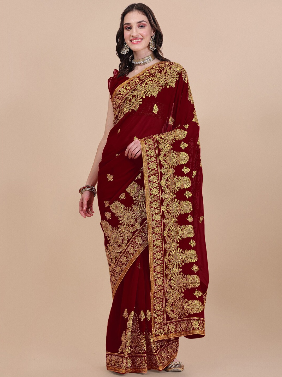 

Vaidehi Fashion Maroon & Gold-Toned Floral Embroidered Pure Georgette Saree