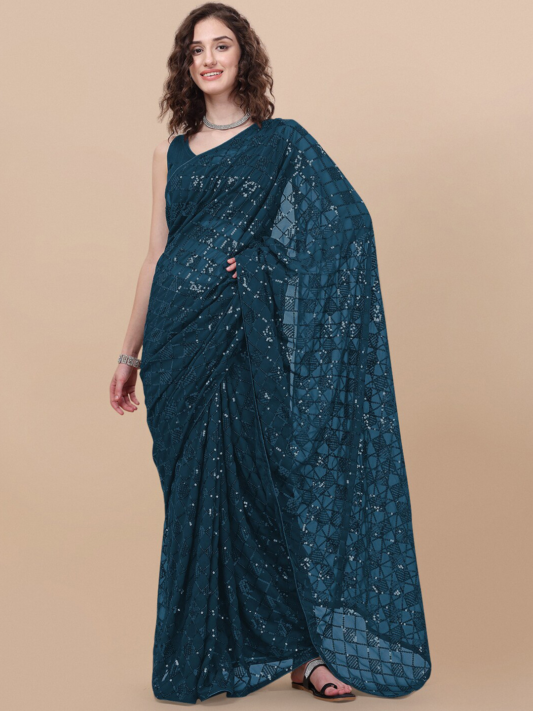 

Vaidehi Fashion Green Embellished Sequinned Pure Georgette Saree
