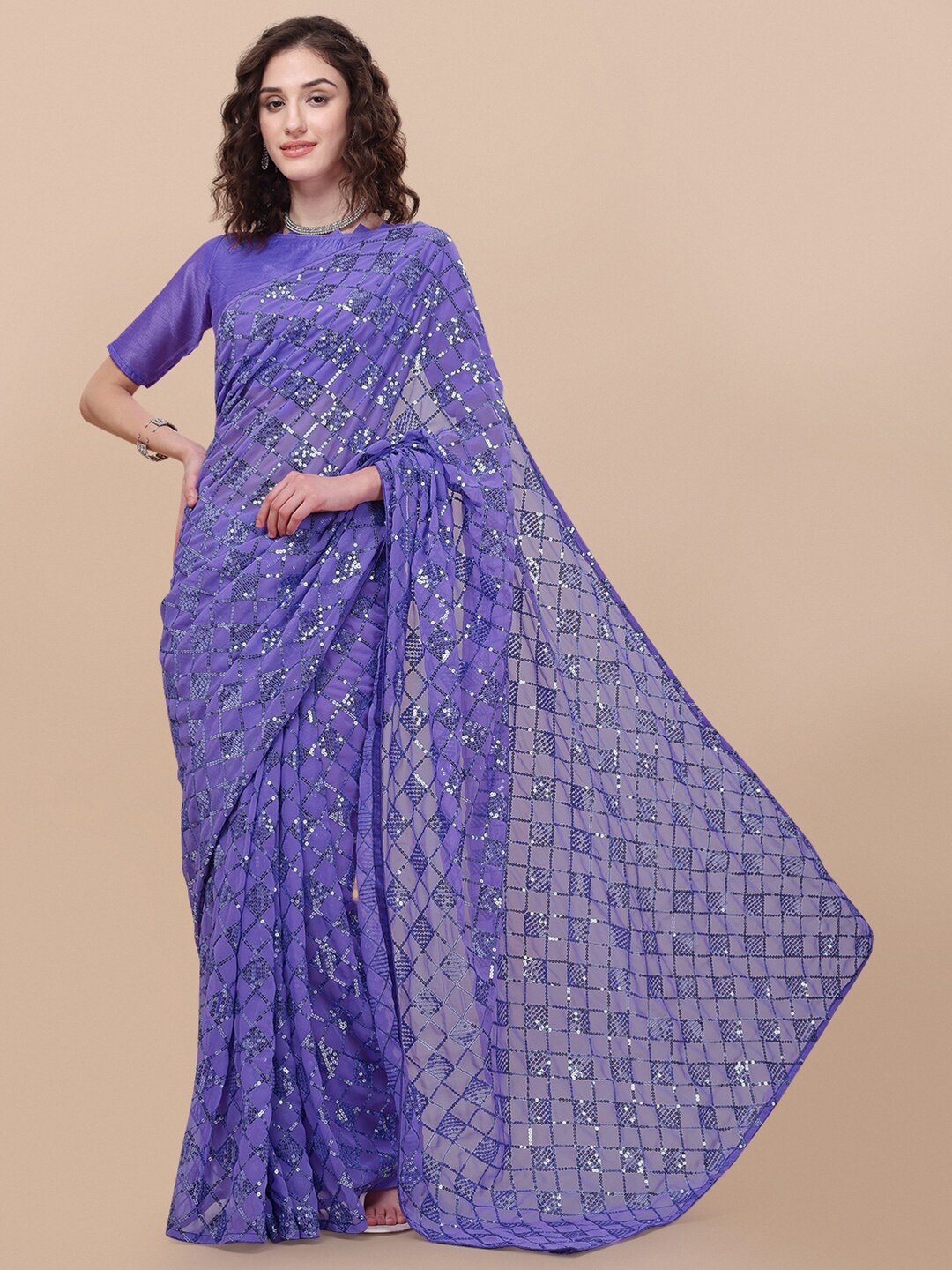 

Vaidehi Fashion Lavender Embellished Sequinned Pure Georgette Saree