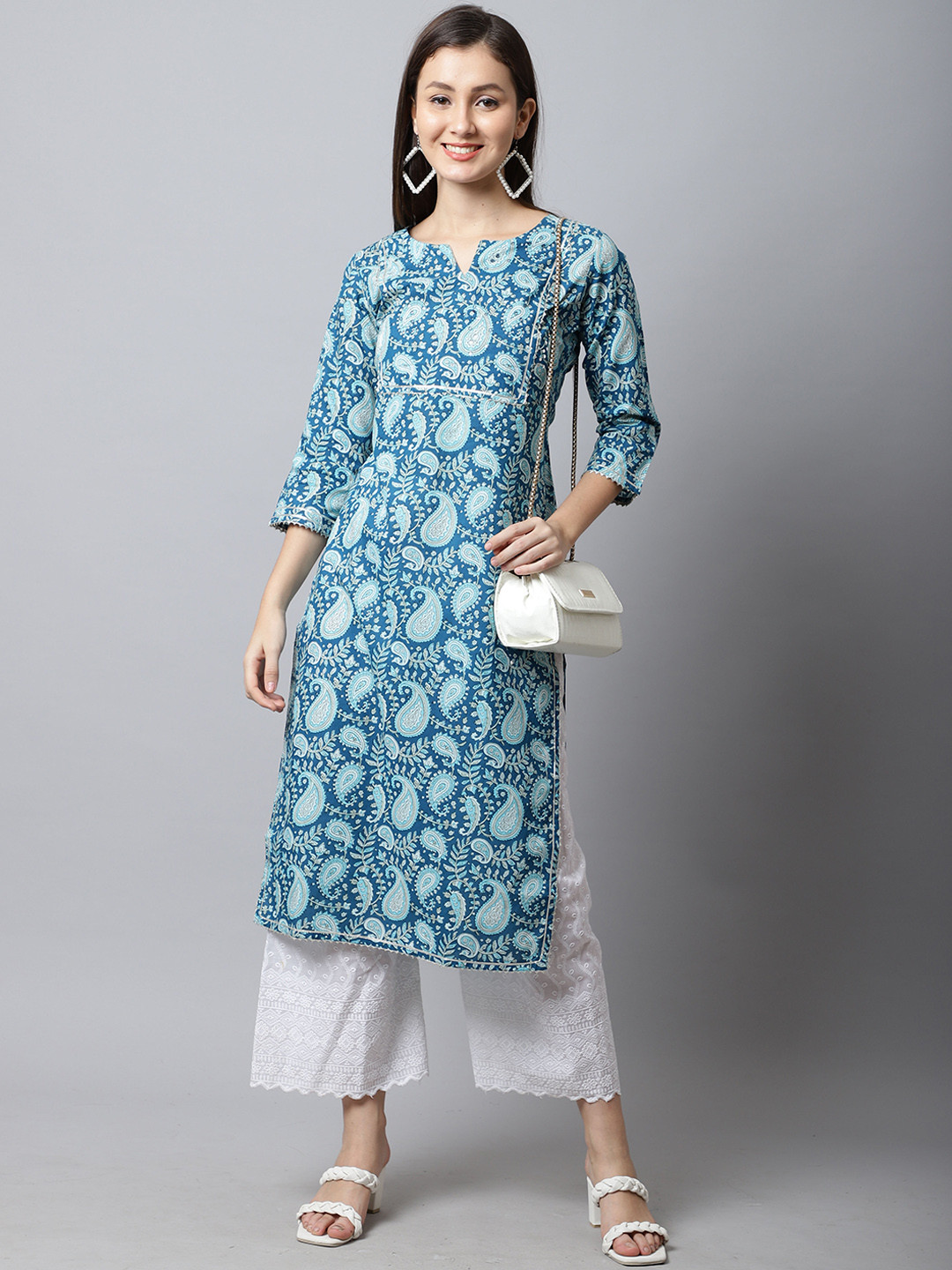 

Rajnandini Women Blue Ethnic Motifs Printed Keyhole Neck Kurta