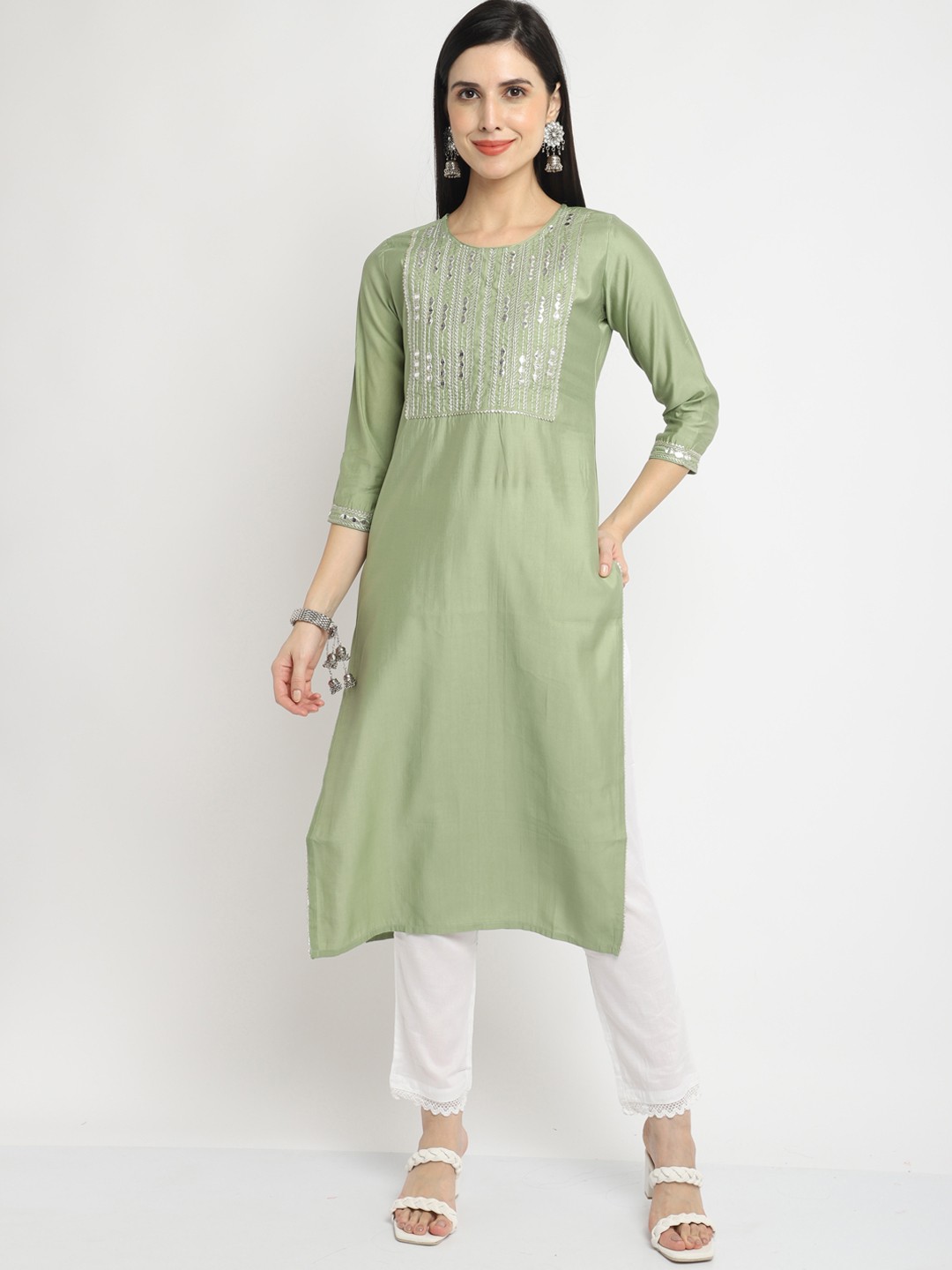 

Rajnandini Women Green Yoke Design Flared Sleeves Thread Work Chanderi Silk Kurta