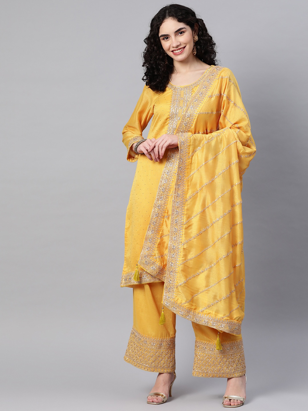 

Readiprint Fashions Yellow Embellished Art Silk Semi-Stitched Dress Material