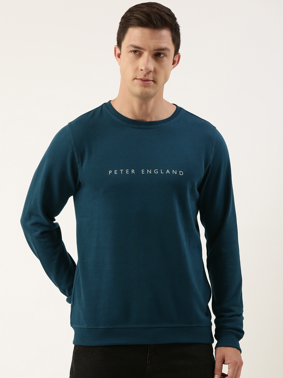 

Peter England Men Brand Logo Printed Sweatshirt, Blue