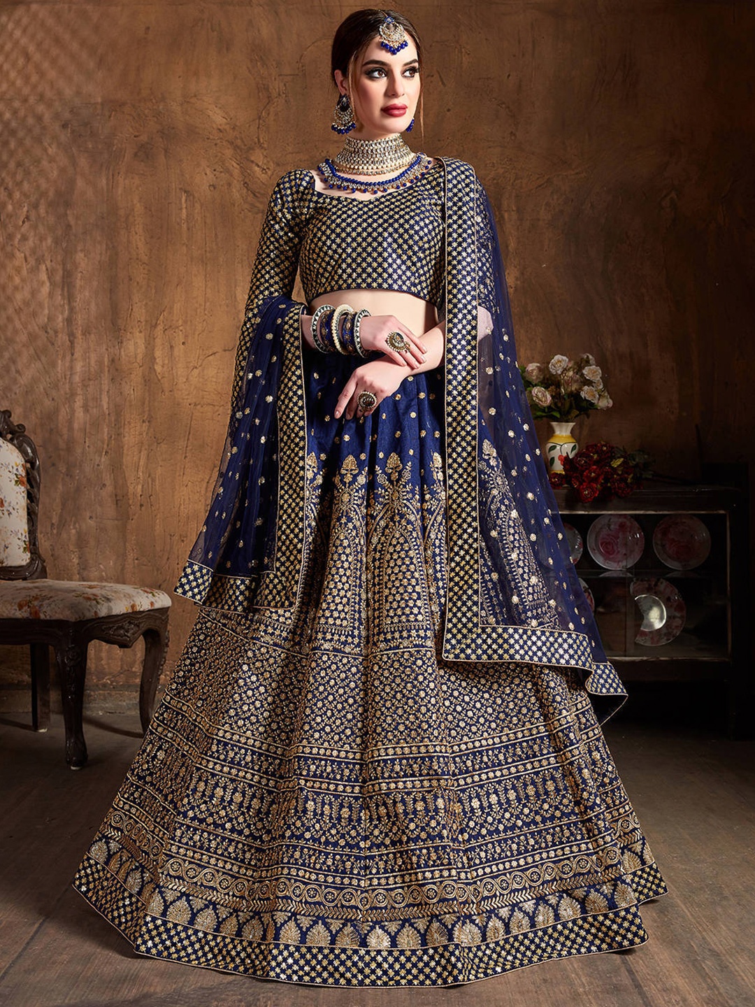 

FABPIXEL Women Navy Blue & Gold Embroidered Semi-Stitched Lehenga Choli Set