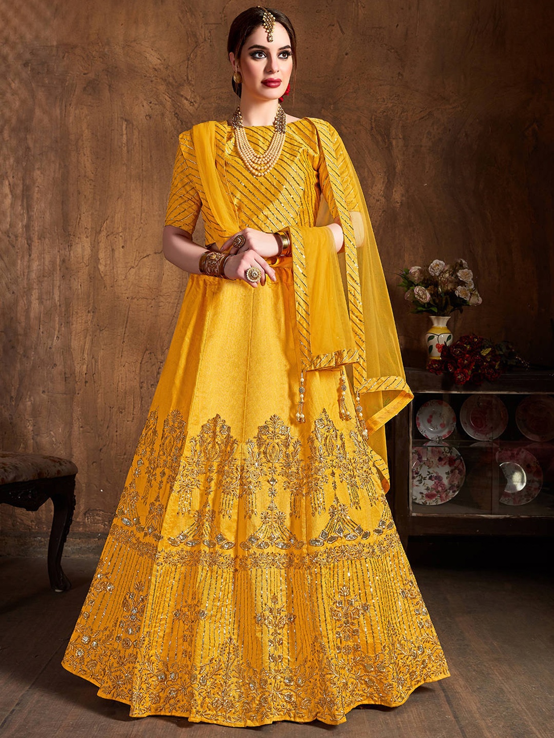 

FABPIXEL Yellow & Gold-Toned Embroidered Semi-Stitched Lehenga & Unstitched Blouse With Dupatta