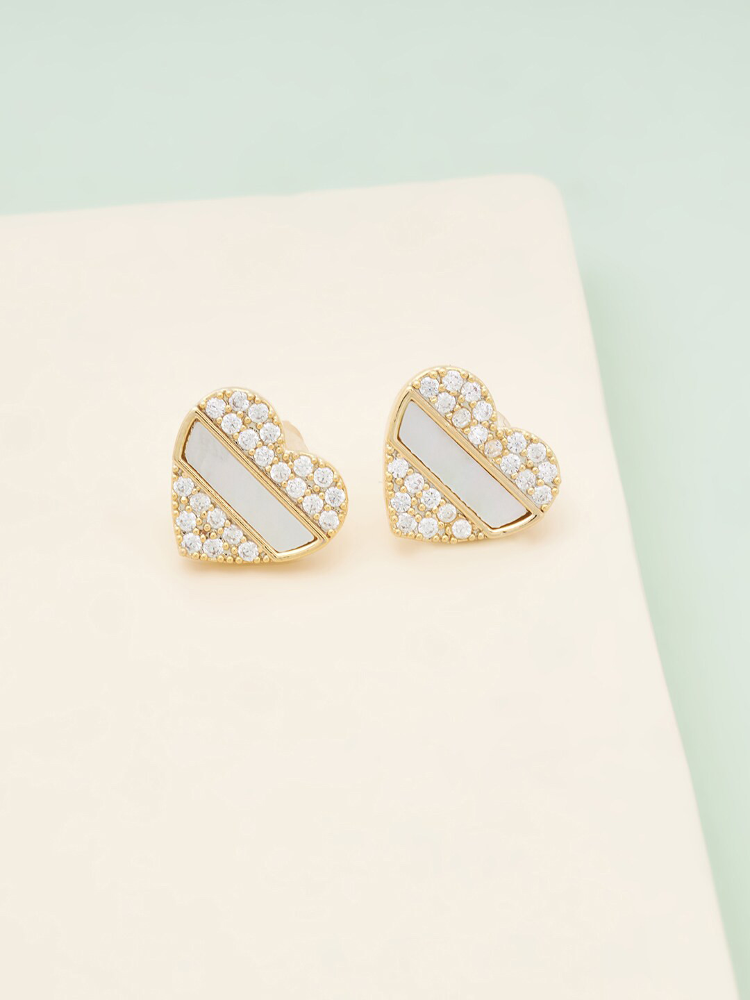 

Kushal's Fashion Jewellery White Heart Shaped Studs Earrings