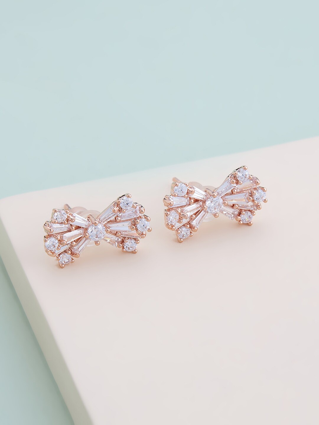 

Kushal's Fashion Jewellery Women Rose-Gold Plated White Contemporary Studs Earrings