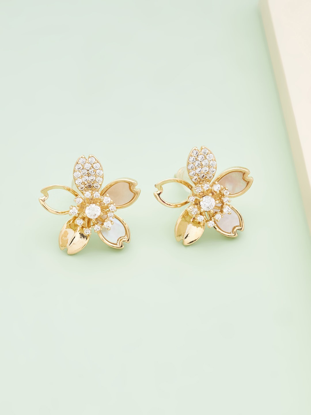 

Kushal's Fashion Jewellery Gold Plated Floral Studs Earrings