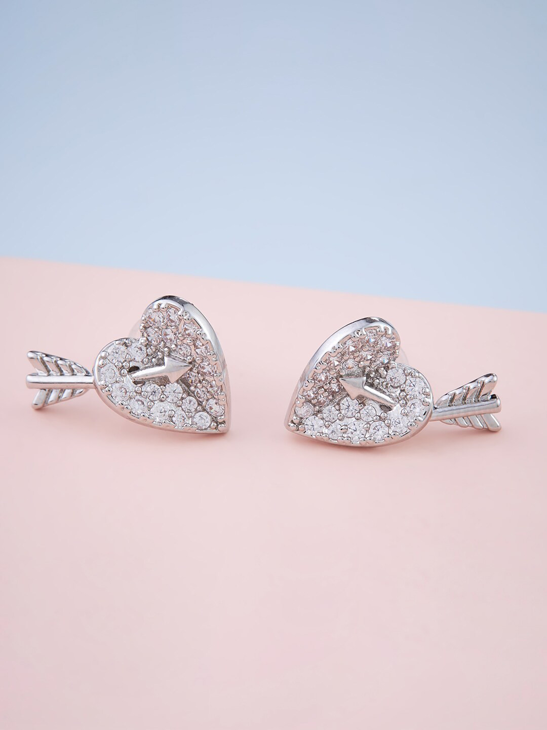 

Kushal's Fashion Jewellery Silver-Toned Heart Shaped Studs Earrings