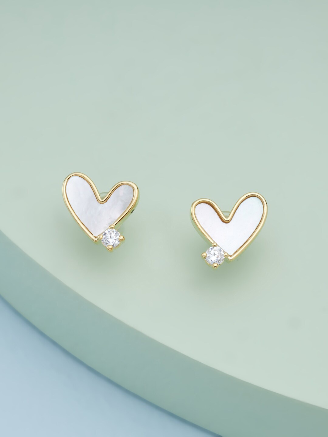 

Kushal's Fashion Jewellery White Heart Shaped Studs Earrings