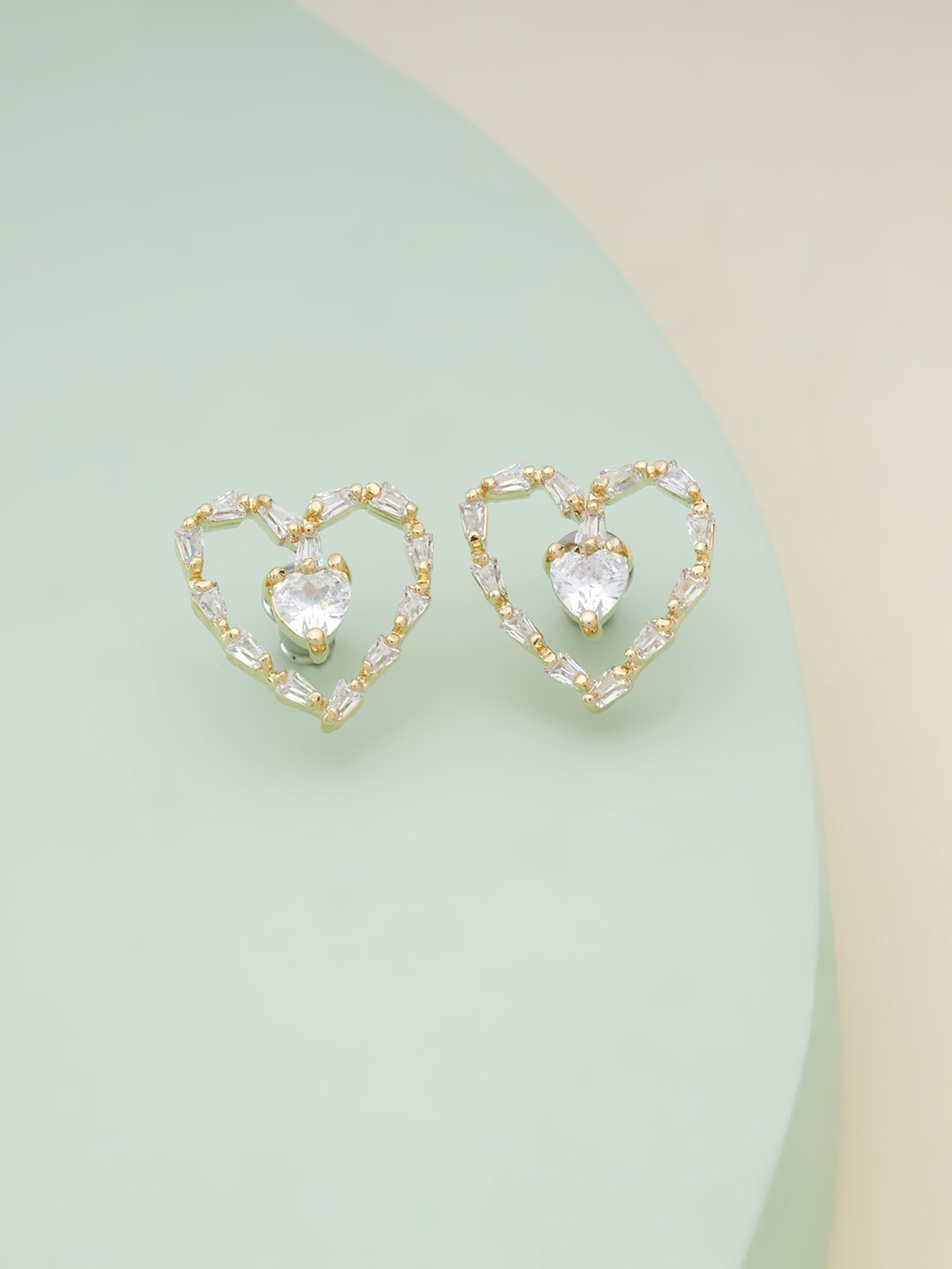 

Kushal's Fashion Jewellery Gold Plated Heart Shaped Studs Earrings