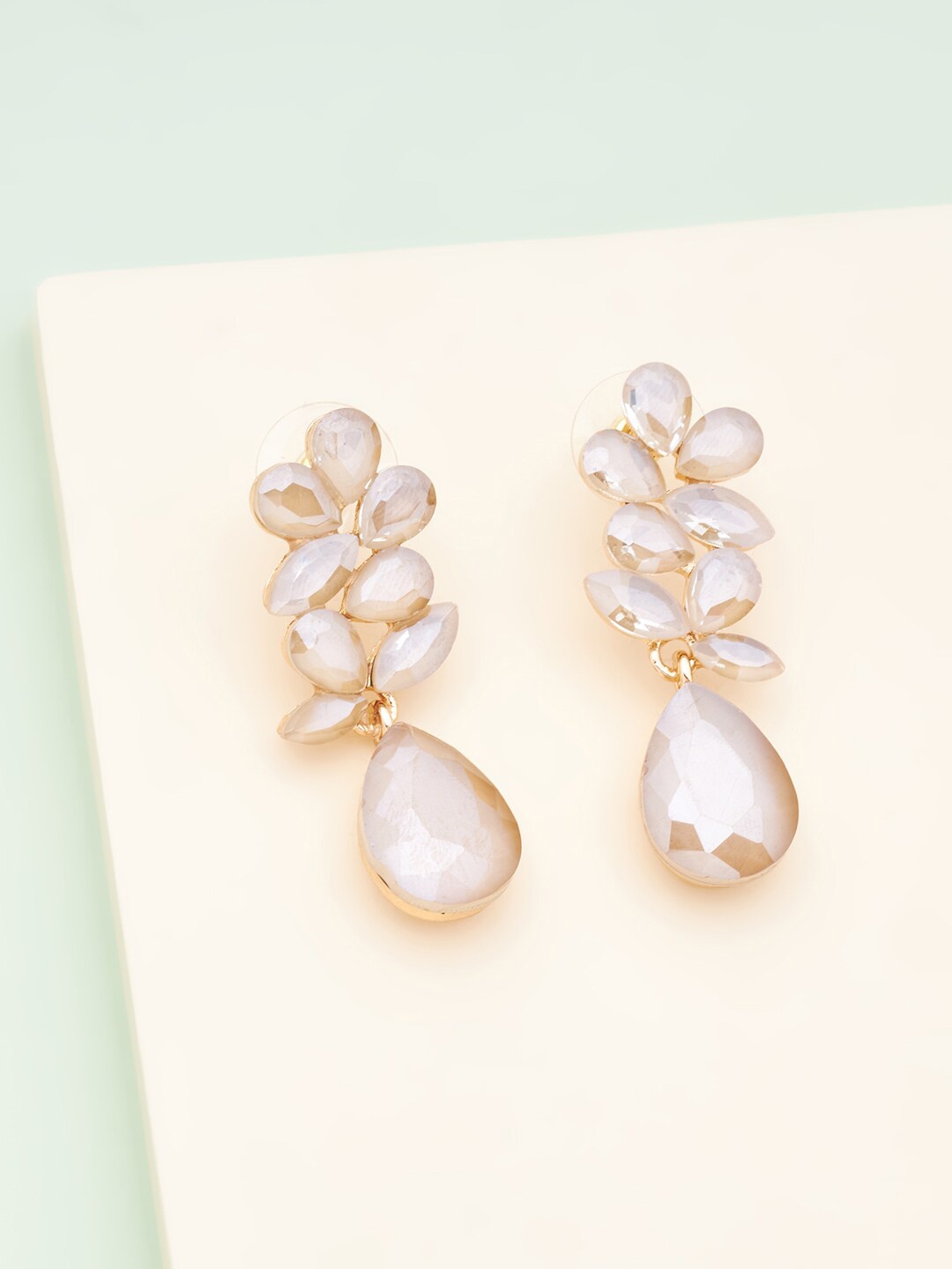 

Kushal's Fashion Jewellery Champagne Teardrop Shaped Gold Plated Studs Earrings