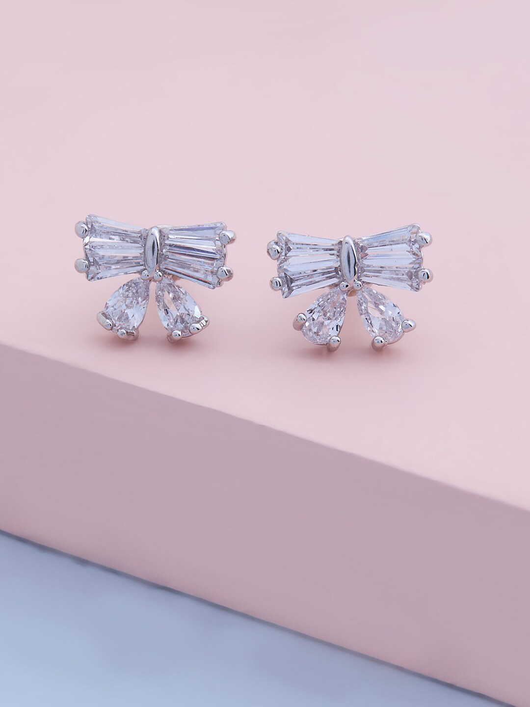 

Kushal's Fashion Jewellery White Contemporary Studs Earrings