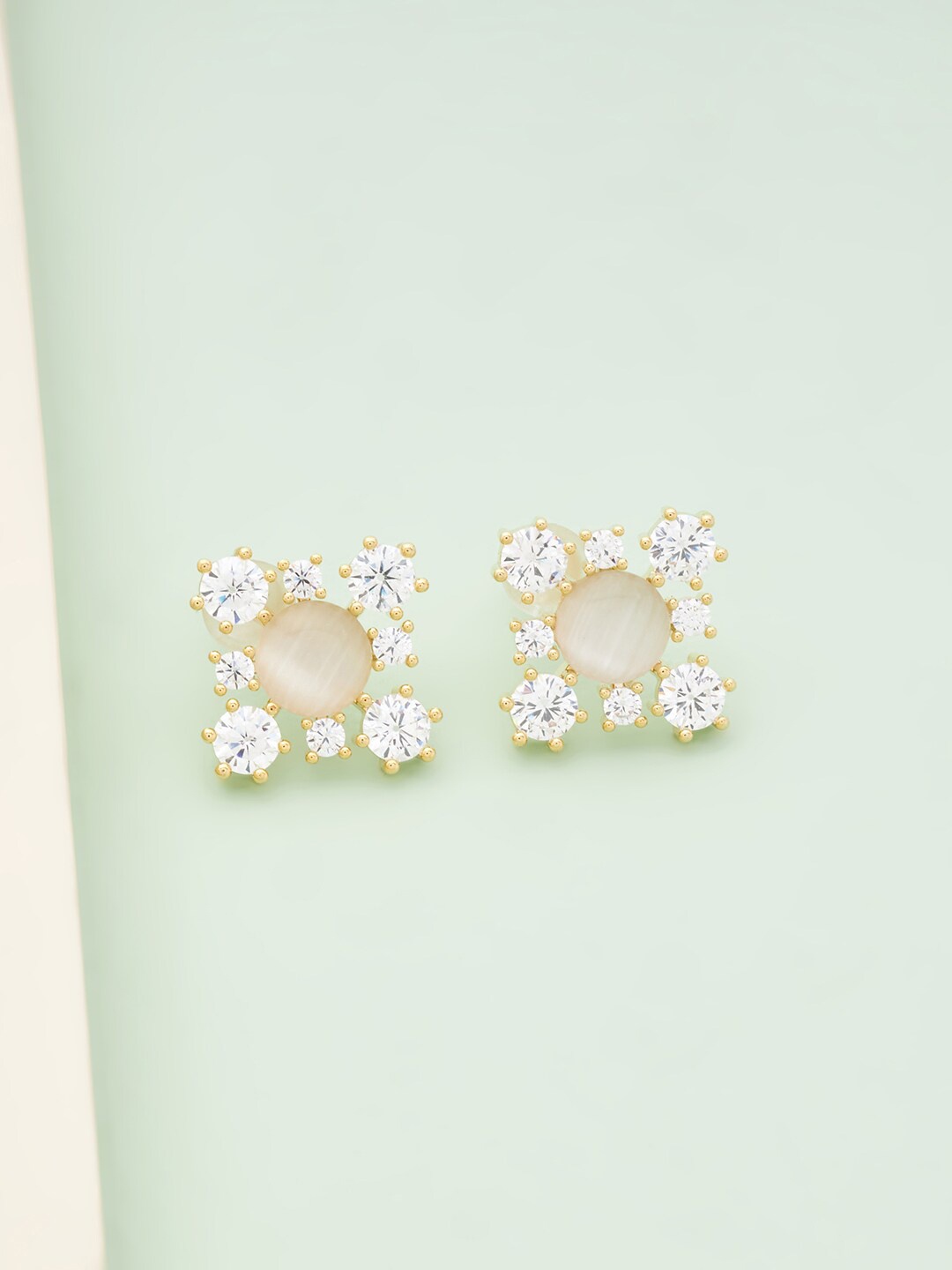

Kushal's Fashion Jewellery Women Gold Plated Cream-Coloured Square Studs Earrings