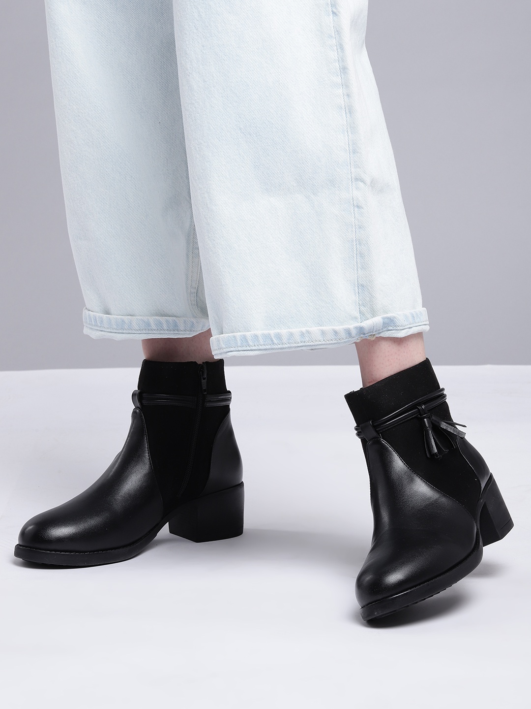 

Roadster Women Black Solid Mid-Top Block Heel Boots