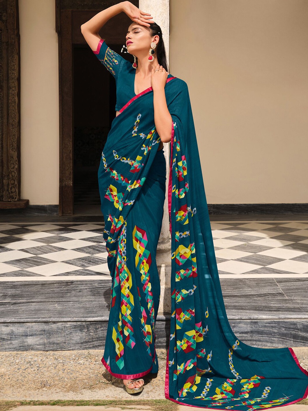 

Satrani Teal & Yellow Saree