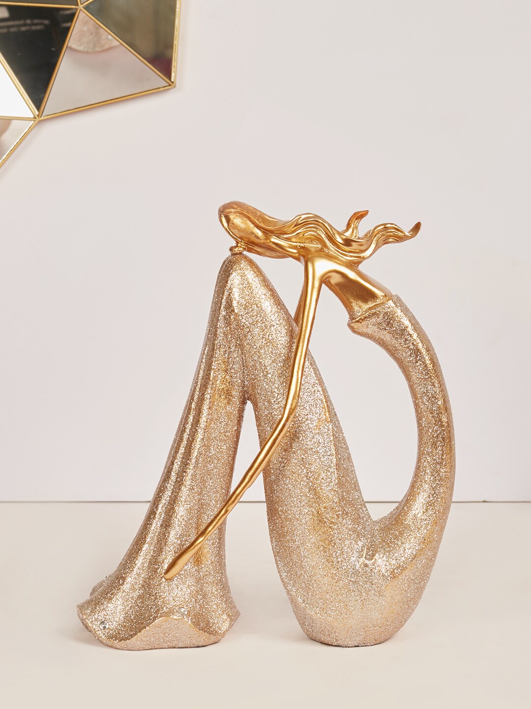

HomeTown Gold-Toned Textured Lady Resting On Lap Showpiece