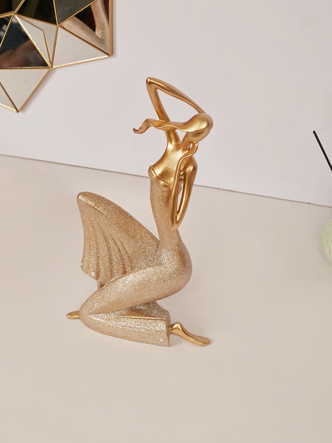

HomeTown Gold-Toned Yoga Lady Figurine Showpieces