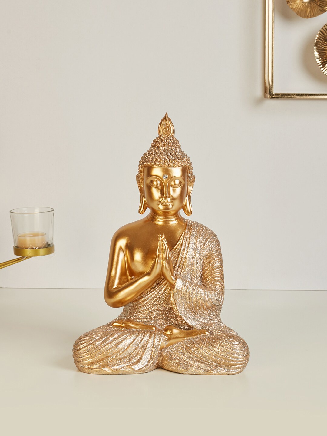 

HomeTown Gold-Toned Praying Buddha Figurine Showpieces